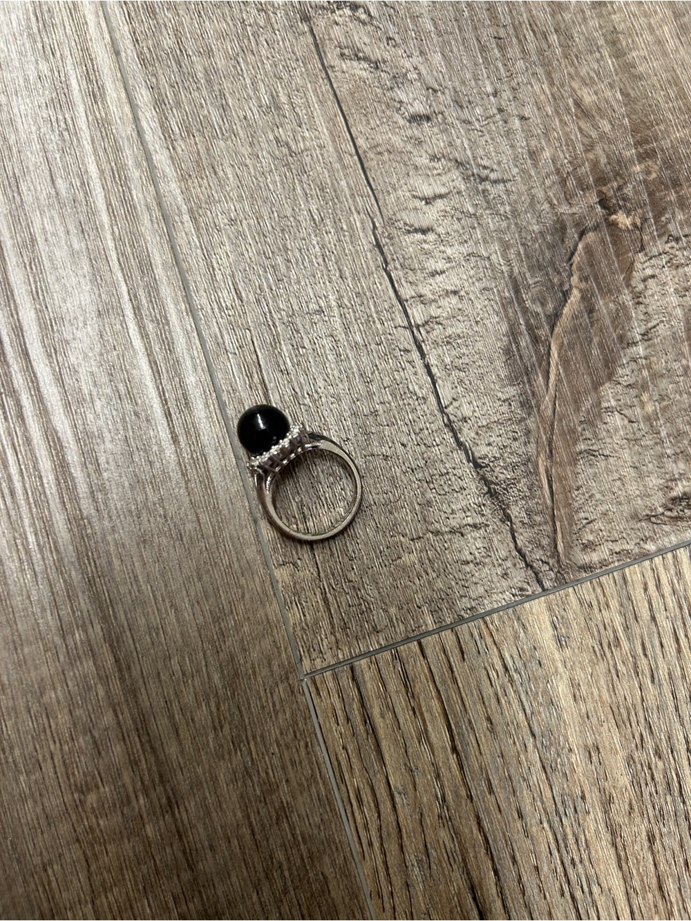 Silver and black ring